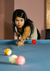 Image showing woman playing pool