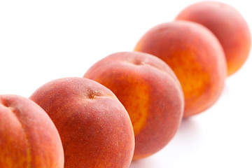 Image showing five peaches