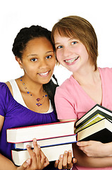 Image showing Girls holding text books