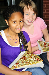 Image showing Girls eating pizza