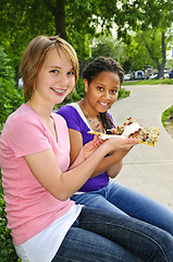 Image showing Girls eating pizza