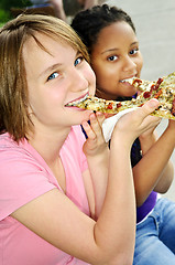 Image showing Girls eating pizza