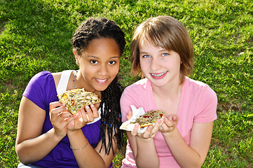 Image showing Girls eating pizza