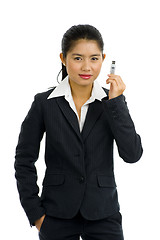 Image showing beautiful business woman with usb stick