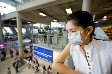 Image showing with flu mask at the airport