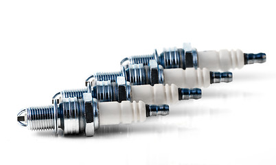 Image showing Four spark plugs for car's engine