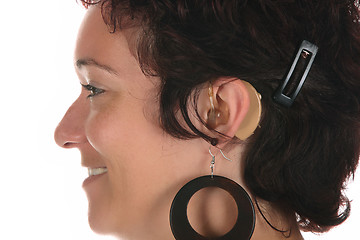 Image showing Beautiful young woman with hearing aid