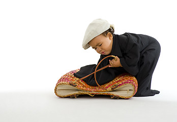 Image showing preschooler with huge shirt, bag and hat