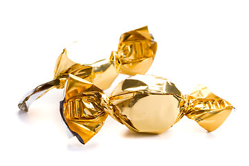 Image showing two golden sweets
