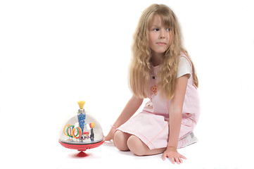 Image showing Little girl playing with toy