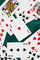 Image showing poker cards on green silk