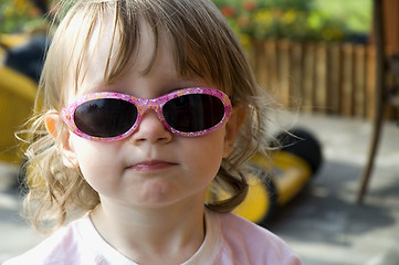 Image showing girl wearing funny sunglasses