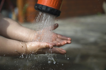 Image showing Child is washing hands