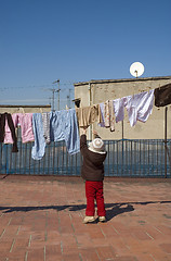 Image showing portrait of a sweet girl with the clothesline