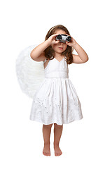 Image showing Heavenly angel looking watching through binoculars