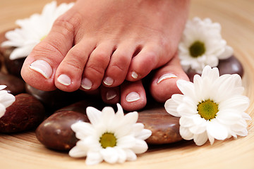 Image showing feet and pebbles