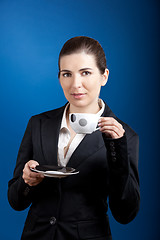 Image showing Drinking a coffee