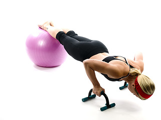 Image showing   illustration pose middle age woman push up bars and fitness co