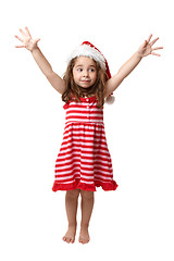 Image showing Christmas Girl with hands in the air