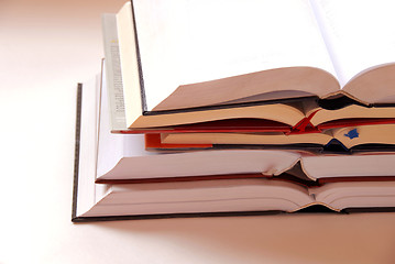 Image showing Opened books stack