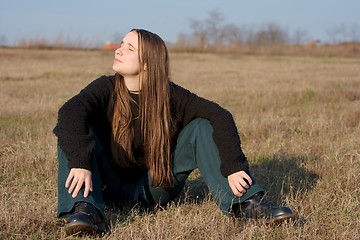 Image showing Girl Sitting