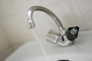 Image showing Flowing tap