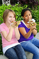 Image showing Girls eating pizza