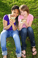 Image showing Girls eating pizza