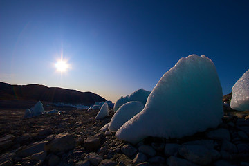 Image showing Ice in the middle of a dried out lake