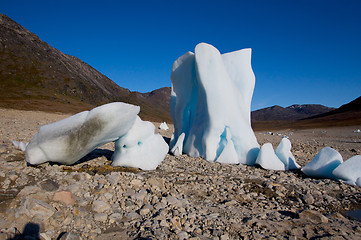 Image showing Icebergs in the middle of a dried out lake