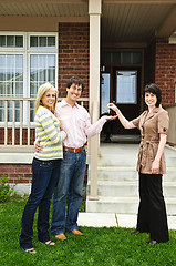 Image showing Happy couple with real estate agent