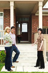 Image showing Happy couple with real estate agent