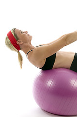 Image showing sit ups strength pose middle age woman fitness core ball