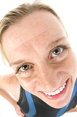 Image showing middle age female tri-athlete in swimming wet suit