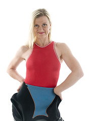 Image showing middle age female triathlete in swimming wet suit