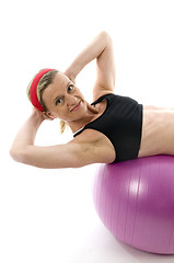 Image showing   sit ups strength pose middle age woman fitness core ball