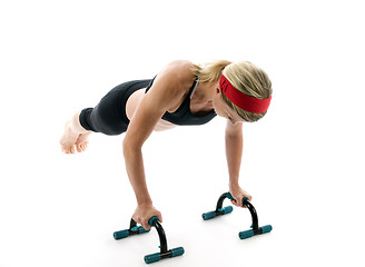 Image showing   push up fitness bars woman exercising