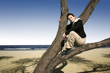 Image showing Girl in a tree