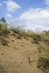 Image showing Sand dunes under a nice clouded sky