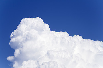 Image showing Clear Blue Sky and sunlit white cloud