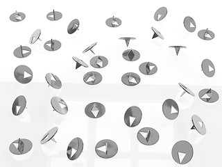 Image showing metallic thumbtacks (drawing pins) on white background