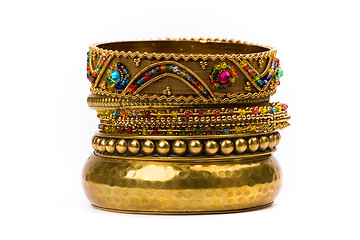 Image showing stack of golden bracelets