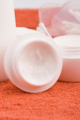 Image showing cream and cotton pads