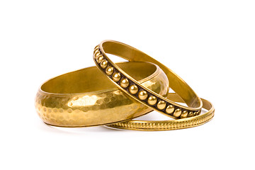 Image showing three golden bracelets