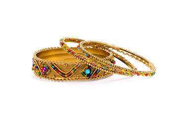 Image showing three golden bracelets