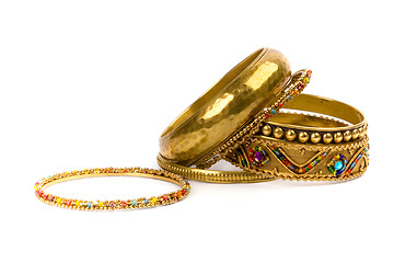 Image showing golden bracelets