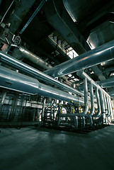 Image showing different size and shaped pipes at a power plant