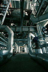 Image showing different size and shaped pipes at a power plant