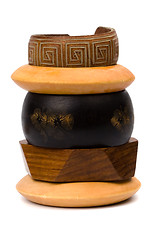Image showing stack of wooden and leather bracelets