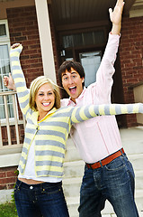 Image showing Excited couple at home